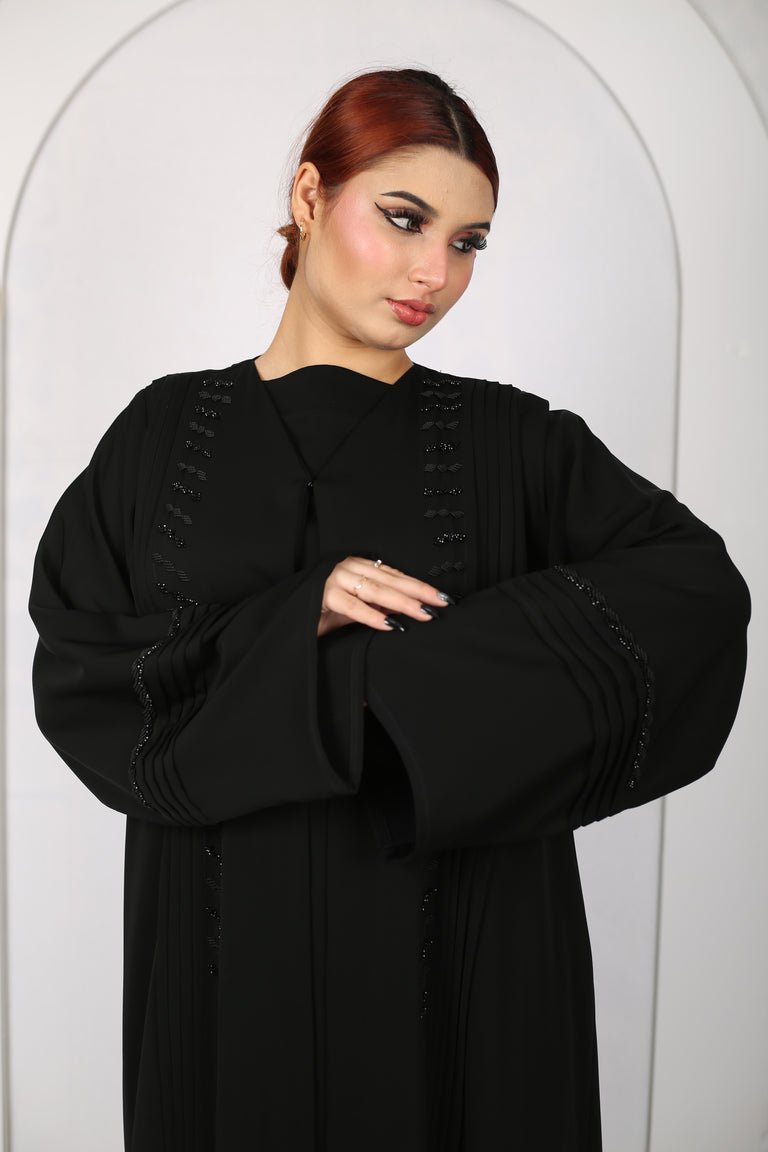 Premium handwork and embroidery abaya made in UAE featuring elegant handcrafted detailing