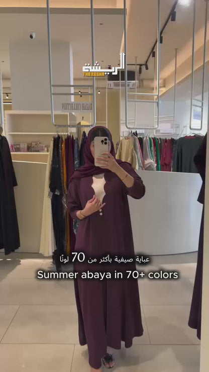 عباءة عمرة سوداء رقم ١٠١ بأكمام بسحاب وجيوب - ذا ريشة