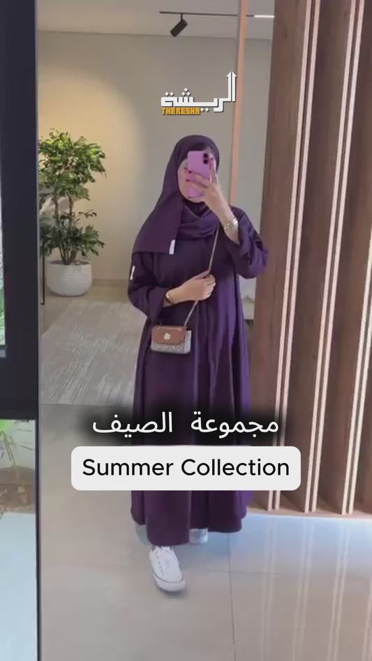 عباءة عمرة سوداء رقم ١٠١ بأكمام بسحاب وجيوب - ذا ريشة