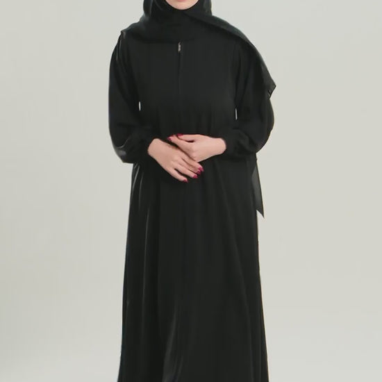 Premium Umrah Abaya Model U103 with full front zipper and elastic sleeves in black, made in UAE