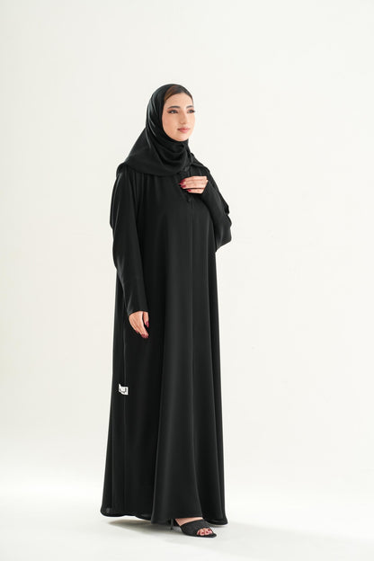 Premium Umrah & Hajj Abaya Model U101 with front button opening and sleeve zippers, made in UAE